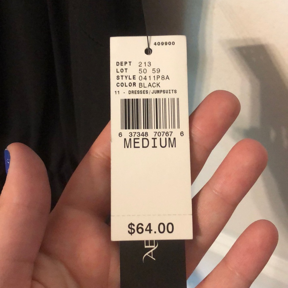 AB Studio lace trimmed sleeveless black jumpsuit - Picture 7 of 7